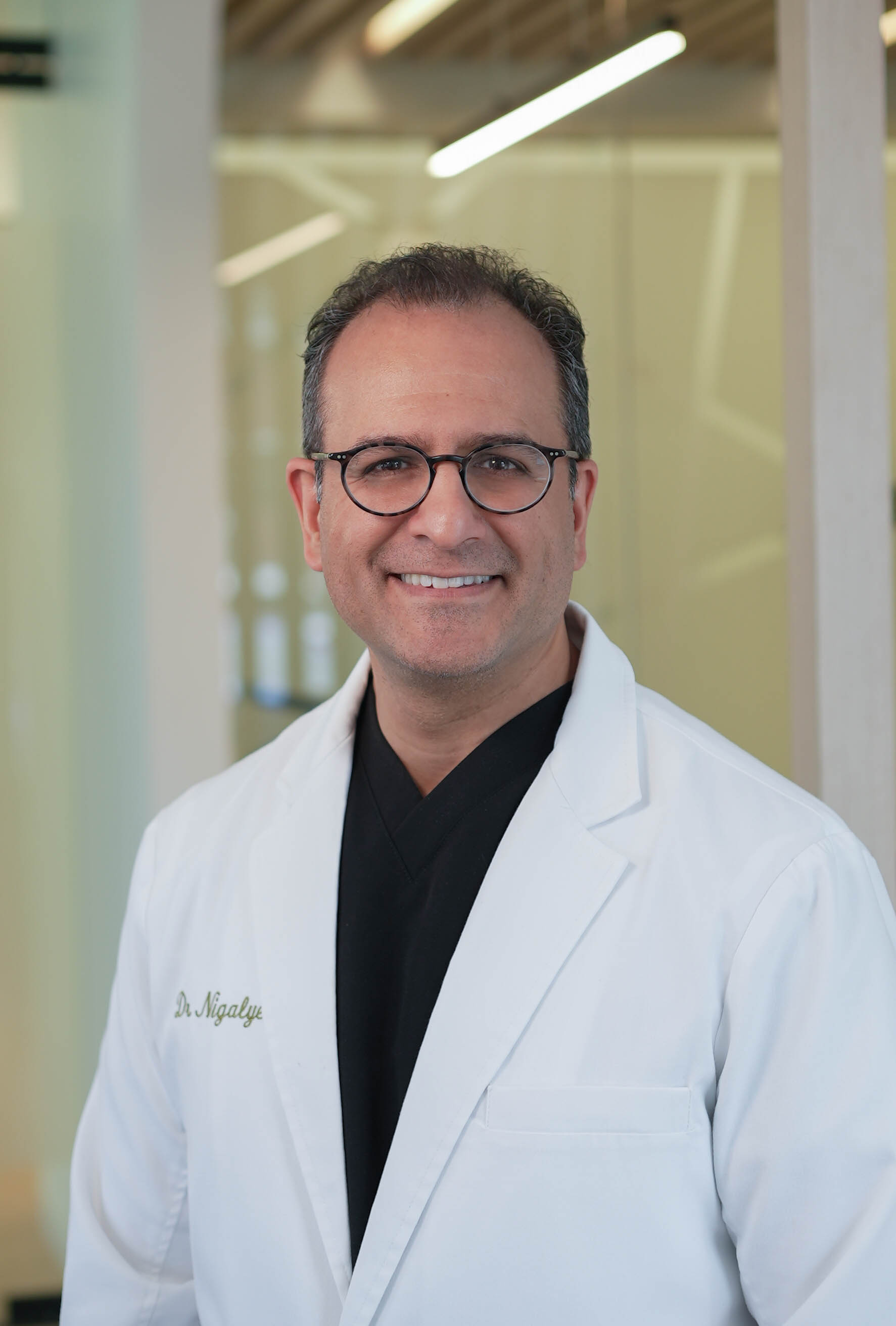 Dr. Nigalye, board-certified oral surgeon at Niagara Dental Implant & Oral Surgery